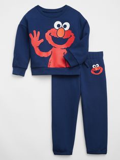 babyGap | Sesame Street Fleece Two-Piece Outfit Set | Gap Factory Playful Long Sleeve Sweatshirt For Loungewear, Fall Long Sleeve Sweats With Elastic Waistband, Blue Sweats With Elastic Waistband For Winter, Playful Sweatshirt For Fall Loungewear, Casual Character Print Sweatshirt For Loungewear, Casual Graphic Print Sweatshirt For Playwear, Long Sleeve Sweatshirt With Ribbed Cuffs For Play, Blue Winter Sweats With Elastic Waistband, Playful Sweatshirt With Ribbed Cuffs For Loungewear