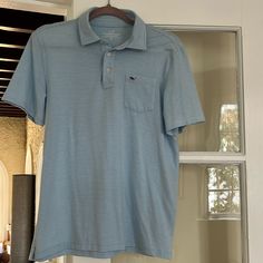 New Vineyard Vines Edgarton Pima Cotton Blend Golf Polo. 3 Button At Collar. New Without Tags. Beautiful Soft And Lightweight Material. Baby Blue And White Stripe Pattern. Boys Xl Light Blue Cotton Polo Shirt For Summer, Blue Casual Polo Shirt With Pockets, Light Blue Cotton Polo Collar Tops, Casual Blue Polo Shirt With Pockets, Fitted Light Blue Casual Polo Shirt, Blue Cotton Button-up Polo Shirt, Spring Light Blue Cotton Polo Shirt, Light Blue Cotton Polo Shirt For Spring, Light Blue Collared Casual T-shirt