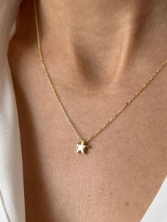 Cute and tiny starfish to be on style ✨ Get this beautiful minimalist jewelry made with the quality of perfect elements✨ You can choose 925K Sterling Silver with the options of Gold, Rose Gold or White Gold colors. High quality jewelry for everyone ❤️  Details * 925K Sterling Silver Option → 14K Gold, Rose Gold or White Gold plated * Chain length is approximately 18 inches (16+2 in extender) / 45 cm (40+5 cm extender) * Time is everything! You will receive your package as soon as possible 🚚  * We care about the quality of metal to make sure it will last for a long time * We use enamel technique to color the jewelry and high quality zircons only * There can be tiny differences on each item. Length difference of the chain as well as color changes and shade differences of the stones and enam Delicate Star-shaped Jewelry For Everyday, Dainty 14k Gold Filled Star Charm Necklaces, Delicate Everyday Star-shaped Jewelry, Dainty 14k Gold Filled Star Charm Necklace, Minimalist Star-shaped Everyday Jewelry, Minimalist Gold Jewelry With Starfish Charm, Minimalist Starfish Jewelry Gift, Minimalist Yellow Gold Star Necklace, Minimalist Star Shaped Jewelry With Star Charm