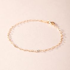 Tiny Hearts Bracelet, Yellow Gold | Catbird Jewelry Elegant Heart Charm Bracelet For Friendship, Dainty Delicate Chain Link Bracelet, Delicate Heart Bracelet With Chain For Everyday Wear, Delicate Heart Bracelet With Delicate Chain For Everyday, Rose Gold Chain Bracelet With Heart Charm For Everyday, Elegant Everyday Chain Bracelet With Heart Charm, Delicate Heart Bracelet With Delicate Chain, Elegant Heart Bracelet For Friendship, Everyday Rose Gold Chain Bracelet With Heart Charm