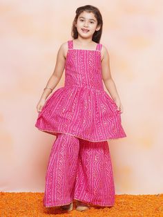 **Specifications : Please visit our brand store** https://www.etsy.com/in-en/shop/AJDezines?ref=seller-platform-mcnav .Kurta Fabric - Cotton | Sharara Fabric - Cotton .Package Content - 1 Kurta, 1 Sharara ||Style:- Kurta Sharara Set For Kids Girls .Top Details : Sleeveless , Bandhani Print, Square Neck, Cotton Fabric Bottom Details : Cotton Fabric, .Bandhani Print, .Specially Crafted Ethnic Set for the perfect look and comfort for the Summer Festive Season .Occasion: The Perfect set for Your You Pink Sleeveless Sharara For Festivals, Pink Sleeveless Anarkali Set For Festive, Pink Sleeveless Dress For Diwali, Sleeveless Pink Dress For Diwali, Festive Sleeveless Bandhani Print Set, Festive Sleeveless Sets With Bandhani Print, Sleeveless Pink Anarkali Set For Festivals, Pink Sleeveless Traditional Wear For Festive Occasions, Sleeveless Sets For Festivals And Celebrations