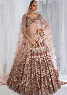 Raw silk bridal lehenga with thread and zardosi embroidery with a tulle dupatta and a tulle head veil. Embroidered blouse. Silk Bridal Lehenga, Head Veil, Pink Bridal Lehenga, Raw Silk Lehenga, Zardozi Embroidery, Champagne Pink, Pink Lehenga, Silk Tulle, Lehenga Blouse