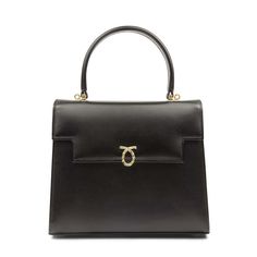 Traviata Handbag in Black and Royal PurpleLauner's most famous design. Instantly recognizable as the go-to-handbag of H.M. Queen Elizabeth II and the Queen Mother, this elegant bag is crafted entirely by hand in England. Each of these soft leather handbags is made-to-order, following the exacting standards of the client. The leather is imported from Italy and only butter-soft, unblemished hides are chosen by Launer's leather buyer. Every piece has perfectly rounded corners and smooth, turned-edg Launer Bag, Launer London, La Traviata, Blue Leather Bag, Luxury Leather Bag, Purple Interior, Soft Leather Handbags, Elegant Bags, Top Handle Handbags