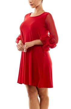 Mesh 3/4 length sleeves with ruffled cuffs accent a round neck dress for an en vogue style. 36" length (size S) Round neck 3/4 length mesh sleeves with ruffle cuffs Slips on over head Unlined 95% polyester, 5% spandex Machine wash cold Imported Model stats: 5'10" height, 32" bust, 25" waist, 36" hip. Model is wearing size S. Red Party Dress With 3/4 Sleeves, Red 3/4 Sleeve Party Dress, Red Midi Dress With 3/4 Sleeves, Red Long-sleeved Mini Dress With Ruffles, Red V-neck Mini Dress With Ruffle Hem, Mesh Sleeves, Round Neck Dresses, Vogue Fashion, Length Sleeve