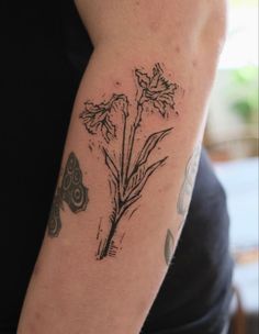 a person with a tattoo on their arm