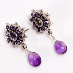 ------------------------------------------ Welcome to Our Shop VARSHAIMPEX ------------------------------------------ Elegant Amethyst Earrings, Purple Gemstone Earrings, Drop & Dangle Earrings, 925 Sterling Silver Jewelry, Wedding Gift, Earrings For Love Description :- SKU:- E-103 Metal:-  Sterling Silver Metal Purity:- 925 Gemstone:- Amethyst Gemstone Color:- Purple Gemstone Shape :- Pear Gemstone Creation :- Natural Stone Setting :- Bezel ♥ CUSTOMIZATION OPTIONS ♥ Tailor your jewelry with personalized choices for birthstones, gemstones, hearts, stars, and the option for with or without them in these styles ♥ SAFE AND SENSITIVE ♥ Our sterling silver jewelry is harm-free, nickel-free, lead-free, and hypoallergenic, meticulously crafted by VARSHAIMPEX. ♥ PERFECT GIFT ♥ Celebrate birthdays, Luxury Purple Briolette Earrings, Luxury Purple Briolette Jewelry, Silver Jewelry Wedding, Bezel Earrings, Earrings Purple, Drop Dangle Earrings, Amethyst Earrings, Jewelry Wedding, Girls Earrings