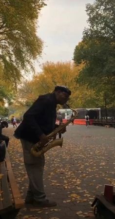 man playing saxophone on a leafy, fall street Ya Like Jazz?, Tiktok Music, Fashion Tiktok, Fall Music, Pure Happiness, Aesthetic Vibes