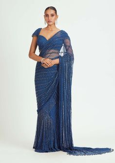 Nitika Gujral-Cobalt Blue Net Draped Sari And Blouse-INDIASPOPUP.COM Festive Blue Pre-draped Saree For Evening, Festive Blue Wedding Pre-draped Saree, Blue Draped Lehenga For Reception, Blue Draped Lehenga With Unstitched Blouse, Fitted Blue Pre-draped Saree For Festive Occasions, Designer Draped Blue Lehenga, Blue Draped Lehenga With Dupatta, Blue Draped Blouse Piece For Evening, Elegant Blue Pre-draped Saree For Festive Occasions