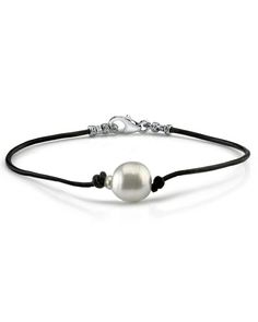 This beautiful White South Sea Pearl Leather Rope Bracelet offers versatility and can be adjusted to fit any size wrist. Classic Adjustable Leather Bracelet, Elegant White Beaded Bracelets With Sliding Knot, Elegant Beaded Bracelets With Sliding Knot, Elegant Adjustable Single Strand Pearl Bracelet, Elegant Silver Adjustable Leather Bracelet, Elegant Silver Leather Bracelet Adjustable, Adjustable Single Strand Bracelet For Formal Occasions, Elegant Adjustable Bracelet With Sliding Knot, Formal Adjustable Single Strand Beaded Bracelets