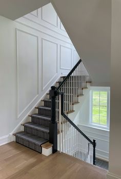 Glenview Family Home — London Walder Interior Design Frame Stairs Wall, Wall Molding Stairs, Foyer Wall Trim, London Style Home, Bannister Update, Stairwell Wainscoting, Stairs Feature Wall, Stair Moulding, Staircase Molding