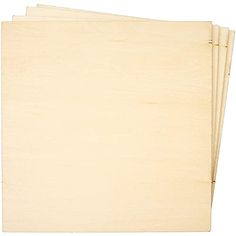 three sheets of parchment paper stacked on top of each other