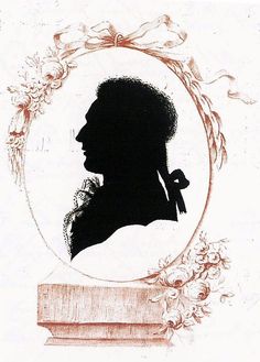 the silhouette of a man with a bow is shown in an oval frame on white paper