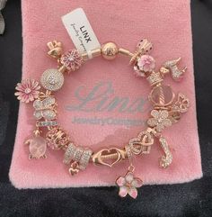 Elegant Rose Gold Charms, Rose Gold Snake Chain Bracelet, Rose Gold Charm Bracelet With Removable Charms, Elegant Rose Gold Jewelry With Removable Charms, Rose Gold Snake Chain Bracelet As Gift, Rose Gold Bracelets With Snake Chain For Gift, Elegant Pink Charms With Removable Details, Elegant Rose Gold Bracelets With Removable Charms, Rose Gold Snake Chain Charm Bracelet Gift