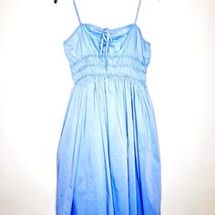 For The Woman That Is Booked And Busy, Brunch, Lunch, The Derby, Or High Tea, This Dress Will Fit All Your Spring And Summer Occasions. It Is Fully Lined, With Adjustable Spaghetti Straps. Made Of Self 65% Cotton And 38% Polyester, Lining 80% Polyester, 20% Cotton. The Measurements Are: Size Large, Pit To Pit 18 Inches, Waist 16 Inches, Length 40 Inches. The Bag And Hat Featured In The Photos Are Available For Purchase In The Closet. This Item Is New With Tags. See Photos For More Details. Blue Cotton Summer Dress, Blue Summer Cotton Dress, Cotton Dress With Smocked Bodice And Spaghetti Straps, Summer Light Blue Cotton Midi Dress, Blue Smocked Bodice Dress For Casual Wear, Light Blue Smocked Bodice Dress For Day Out, Light Blue Smocked Dress For Day Out, Blue Dress With Smocked Bodice For Casual Wear, Light Blue Dress With Smocked Bodice For Day Out