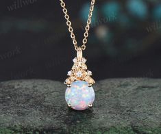 - Metal: Solid gold(14K/18K white/yellow/rose gold),925 sterling silver, platinum available- Main Stone: 6.5mm round lab opal- Accent Stone: diamonds or moissanites- Chain: 16+2 inches. The chain can be adjustable to 18 Inches.- Can be personalized: Yes Elegant Opal Jewelry With Round Stone, Elegant Round Stone Opal Jewelry, White Opal Anniversary Necklace, Elegant Round Opal Necklace, Elegant Round Opal Jewelry, Elegant Opal Round Pendant Jewelry, Elegant Round Opal Pendant Jewelry, Elegant Opal Jewelry In Diamond White, Diamond White Round Opal Jewelry