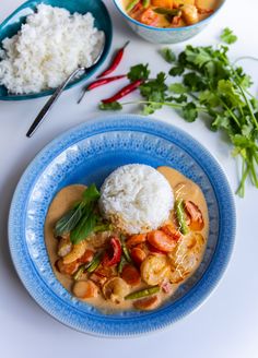 a plate with rice and shrimp on it