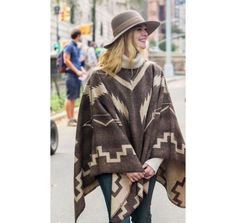 A Rainy Day In New York Elle Fanning Poncho Wool Sweater Cozy Brown Cape Outerwear, Cozy Brown Cape-style Outerwear, Brown Long Sleeve Poncho For Outdoor, One Size Brown Cape Outerwear, One Size Outdoor Cape Outerwear, One Size Cape For Outdoor, One Size Outdoor Cape, One-size Outdoor Cape For Fall, One Size Outdoor Cape For Fall