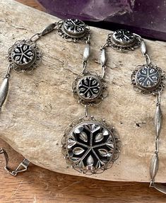 Vintage Silver Carved Jewelry, Vintage Carved Silver Jewelry, Artisan Silver Decorative Jewelry, Ornate Carved Medallion Jewelry, Vintage Silver Carved Necklaces, Silver Vintage Carved Necklaces, Ornate Etched Jewelry For Collectors, Ornate Etched Collectible Jewelry, Vintage Bangle Bracelets