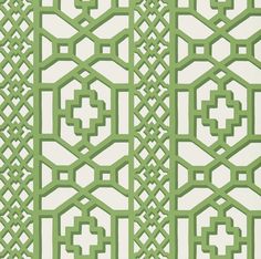 a green and white wallpaper pattern with geometric designs on it's sides, all in different sizes