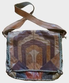 Vintage 70's Char Mexican Patchwork Leather Backpack Messenger Handbag Purse Bag This vintage 70s Char Mexican Patchwork Leather Backpack is a unique addition to any collection. The backpack has a colorful and eye-catching multi-color design that is sure to turn heads. The leather material is durable and perfect for everyday wear and tear. The bag has a unique hippy look that is perfect for casual occasions. This original and authentic bag is a must-have for anyone looking to add a touch of vint Hippie Look, Authentic Bags, Niagara Falls Ny, Purse Bag, Vintage Bags, Handbag Purse, Bag Shoulder, Niagara Falls, Leather Material