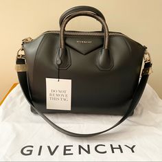 New With Tag. Never Used. 100% Authentic Givenchy Tote. Purchased In 2012. Limited Edition. Special Zipper Detail On Handles. Zip Fastening Along Top. Internal Zipped And Pouch Pockets. Calfskin Leather. Comes With The Dust Bag. 13.5"-15"W X 11"H X 7 3/4"D Cross Post. Elegant Black Bags With Metal Zipper, Givenchy Bag Aesthetic, Elegant Black Bag With Metal Zipper, Luxury Black Bags With Metal Zipper, Givenchy Horizon Bag, Givenchy Mini G Tote, Givenchy Tote Bag, Givenchy Shoulder Bags, Wool Tote Bag