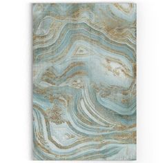 a blue and gold marbled paper with metallic foil on the edges, in an abstract manner