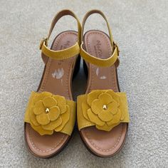 Mariella Yellow Suede Floral Wedge Sandals Nwt 9.5 Never Worn Made In Italy Leather Upper Man Made Some Yellow Flower Beach Wedge Sandals With Heel Strap And Low Heel, Yellow Wedge Heel Sandals With Heel Strap, Floral Wedges, Elegant Sandals, Yellow Flower, Yellow Flowers, Wedge Sandals, Women's Shoes Sandals, Shoes Sandals