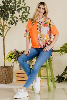 The Floral Short Sleeve T-Shirt is a stylish and versatile addition to your casual wardrobe. The floral print adds a pop of color and a feminine touch to the classic t-shirt silhouette. With short sleeves, this t-shirt is perfect for warm weather and can be easily layered for cooler days. Pair it with jeans for a relaxed and effortless look, or dress it up with a skirt for a more polished ensemble. Whether you're running errands or meeting friends for coffee, this floral t-shirt will keep you co Shirt Silhouette, Meeting Friends, Two Piece Swimwear, Dress Bra, Maxi Dress Formal, Poncho Sweater, Floral Short, Formal Evening Dresses, Basic Style