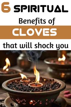 a bowl filled with coffee beans on top of a table next to other bowls and candles