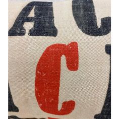 a close up of a pillow with the letter j on it's front and back