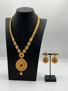 Embrace regal elegance with our exquisite 24K gold-plated Rani Haar set, a true masterpiece designed for the modern queen. This luxurious jewelry set, inspired by traditional royal designs, is perfect for weddings, special occasions, or adding a touch of grandeur to your collection. Care Instructions: To maintain the pristine condition of your Rani Haar set, avoid direct contact with water, perfumes, and harsh chemicals. Store in a dry, cool place when not in use. Rani Haar Gold, Regal Elegance, Rani Haar, Luxurious Jewelry, Royal Design, Christmas Deals, Wedding Jewelry Sets, Luxury Jewelry, Jewelry Set