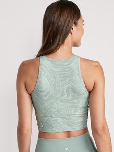 Be poised with every pose in our PowerChill yoga sports bra tank, the perfect balance between om and OMG-softness Crew neck.  Sleeveless arm openings.  Built-in shelf bra, with soft, removable cups for shaping & secure coverage.  Interior front mesh Sports Tops With Built-in Cups And Stretch, Nylon Training Tops With Built-in Padding, Racerback Tops With Built-in Padding And Medium Support, Sporty Workout Tops With Built-in Cups, Sleeveless Activewear With Built-in Cups For Sports, Athleisure Tops With Built-in Cups For Workout, Racerback Activewear With Built-in Cups For Sports, Sporty Racerback Activewear With Built-in Cups, Sporty Gym Tops With Built-in Cups