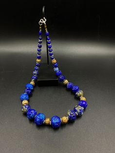 The Beautiful Rare Shape Vintage Antique Lapis Lazuli Beads Necklace Some Gold Color Wax and and Some White Color Brass Beads Are Used As Spacers Rare Shape Lapis Lazuli Beads Festive Blue Beaded Necklace, Blue Polished Beaded Necklaces For Festive Occasions, Blue Beaded Necklaces With Large Beads For Festive Occasions, Festive Blue Beaded Necklaces With Large Beads, Festive Blue Beaded Necklace With Large Beads, Festive Blue Jewelry With Large Beads, Festive Blue Necklace With Colorful Beads, Traditional Blue Single Strand Necklace, Festive Blue Gemstone Beads Necklace