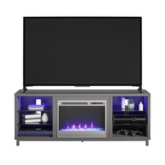 an entertainment center with a television and fireplace