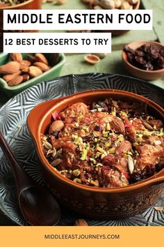 a bowl filled with food next to nuts and raisins on top of a table