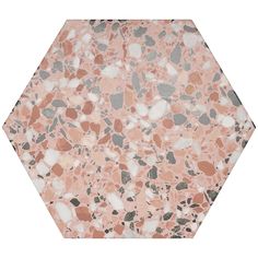 a hexagonal marble table top with pink and grey pebbles