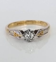 A stunning antique VS clarity diamond ring with a gold band and a superb platinum setting and detailed shoulders. The fabulous diamond is very bright, very fiery and wonderfully clean with excellent VS clarity!! It shimmers and sparkles beautifully in natural daylight and would be perfect as a gift. ▪ Overall Condition: Excellent ▪ Metal: 18ct White Gold & Platinum ▪ Gem: Diamond 0.25ct ▪ Gem Clarity: VS ▪ Gem Colour: H ▪ Ring Size UK: P ▪ Ring Size US: 7.80 ▪ Resizing: Quotation available ▪ Weight: 3.2gms ▪ Marked: Stamped 18ct & PT ▪ Insurance Estimate: £1095 ▪ Payment Layaway Plan Available: Yes ▪ Full Detailed Appraisal: Quotation available As a qualified Gemmologist and Jeweller with over 20 years experience in the jewellery industry, each jewel is chosen for its 'quality, beauty and Art Deco Gold Diamond Ring With Center Stone, Vintage Yellow Gold Wedding Rings With Diamond Accents, White Diamond Ring With Rose Cut For Anniversary, White Rose Cut Diamond Ring For Anniversary, White Rose Cut Diamond Anniversary Ring, Diamond White Solitaire Diamond Ring For Marriage, Diamond White Solitaire Ring For Marriage, Victorian White Diamond Ring With Prong Setting, Solitaire Diamond White Diamond Ring For Marriage