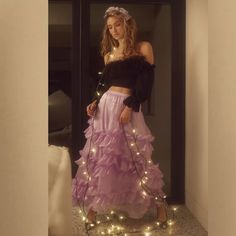 Style No. 79760716; Color Code: So Statement Making With A Charming Touch, This Skirt Is Sure To Stun For Every Occasion. Fit: High-Rise, Billowy A-Line Silhouette Features: Tiered Ruffle Detailing, Semi-Sheer Tulle Fabrication, Exaggerated Wide Waistband, Invisible Zip Closure Why We <3 It: An Effortless Touch Of Luxe To Any Look, Pair These With Sleek Heels Or Toughened Up Moto Boots For Endless Ways To Wear. Care/Import Machine Wash Cold Gentle Import Measurements For Size Small Waist: 29 In Spring Ruffled Maxi Skirt For Night Out, Purple Ruffled Skirt For Party, Feminine Ruffled Maxi Skirt For Party, Maxi Skirt Crop Top, Free People Maxi, Tulle Maxi Skirt, Tiered Maxi Skirt, Free People Skirt, Pink Floral Dress