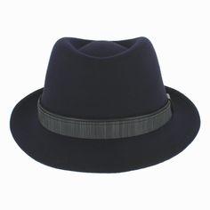 Designed by Sorbatti Hats of Italy, this classic trilby is made of 100% light wool felt that is water repellent, flexible and durable. The Belfry Alldo features a teardrop crown surrounded by a layered hat band of leather and corded twill. This handsome hat is packable and never loses its shape, making for worry-free travel. FEATURES Style: Trilby Materials: 100% WoolDimensions: 4" Crown, 1 3/4" Brim Band: Layered Leather, Corded Twill Pork Pie Hat, Hat Size Chart, Pork Pie, Cloche Hat, Free Travel, Felt Hat, Hat Band, Wool Hat, Top Hat