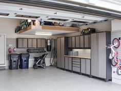 a garage with lots of storage space and various items on the shelves, including bikes