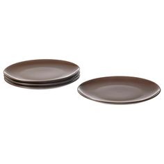 three brown plates sitting on top of each other