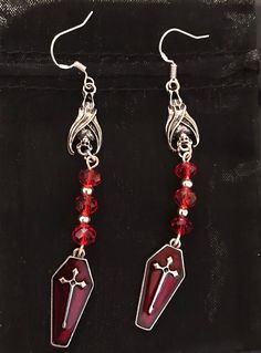 Bat and coffin drop earrings  With 3 red glass beads Earring drop 3 in With either silver plated or sterling silver shepherd hook wires Gothic Red Jewelry For Halloween, Red Gothic Jewelry For Halloween, Red Pierced Halloween Earrings, Nickel-free Vampire Style Dangle Jewelry, Red Pierced Earrings For Halloween, Red Gothic Earrings For Pierced Ears, Nickel-free Red Halloween Jewelry, Red Nickel-free Jewelry For Halloween, Red Metal Halloween Earrings