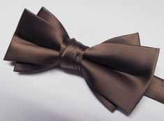 "Beautiful pre-tied and adjustable double tiered banded bow tie. Will adjust from 13\" through 20\" neck. Bow dimensions 2.5\" x 4.5\". Bow tie  Always made by hand and to your special order. Weddings and groups are welcome." Pre-tied Decorative Bow Tie For Party, Pre-tied Bow Tie For Party, Adjustable Pre-tied Decorative Bow, Pre-tied Adjustable Bow For Party, Adjustable Satin Bow Tie For Parties, Elegant Adjustable Bow With Decorative Design, Adjustable Satin Bow For Party, Formal Adjustable Bow Tie With Butterfly Knot, Pre-tied Butterfly Knot Bow Tie For Party