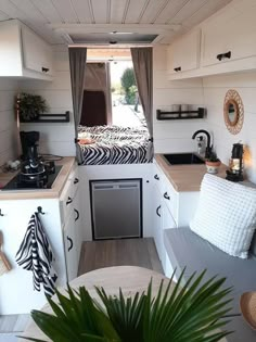 the interior of a tiny home with white walls