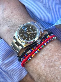 "Trendy minimalist men's beaded bracelet features tiny bright red white heart glass beads handmade in Ghana. Beads are approximately 4mm with bright white centers that give them their name. Beaded on professional stretch elastic with single Karen Hill Tribe 24k gold vermeil cube bead as focal accent. Gold vermeil is real gold over the top of pure .997-.999 Thai silver base. Really stunning! Bracelet is made to fit average size 7\" wrist. If you need a different size please message me. Last photo Everyday Red Friendship Bracelet With Round Beads, Red Beaded Bracelets For Everyday Wear, Minimalist Red Round Bead Bracelets, Colorful Beads Red Evil Eye Bracelet, Red Round Beads Bracelet For Everyday, Red Colorful Beaded Bracelets For Everyday, Minimalist Red Beaded Bracelet With Tiny Beads, Everyday Red Friendship Bracelets With Colorful Beads, Red Beaded Evil Eye Bracelet