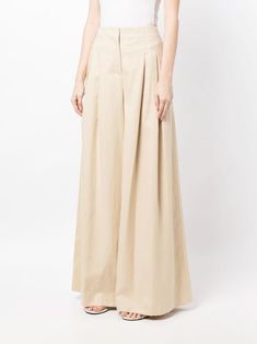 Cut in a coated viscose linen, TWP's Drew Pant is a high-rise, wide-leg, pleated pant. These floor length pants can be perfectly paired with the Her Blazer.[tab] Composition: Viscose, Linen Size and Fit: Runs True to Size Care Instructions: Dry Clean Only Origin: Imported SKU: TWP48P123-BEI Questions about size, fit, or how to style? The KZ team is here to help you look and feel your best! Chat with our stylists via the icon below. Linen Pleated Pants, Linen Palazzo Pants, Pleated Palazzo Pants, Pleated Pant, Peach Orange, Pleated Pants, Box Pleats, Palazzo Pants, Flare Pants