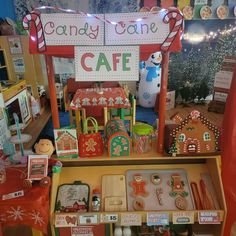 the candy cane cafe is decorated with gingerbreads, cookies and other holiday treats