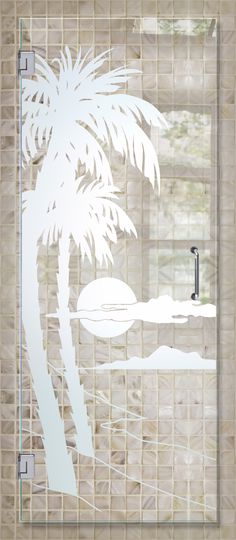 a glass door with a palm tree drawn on it and the window behind it is frosted