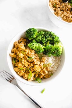 a bowl filled with rice and broccoli next to a plate full of food