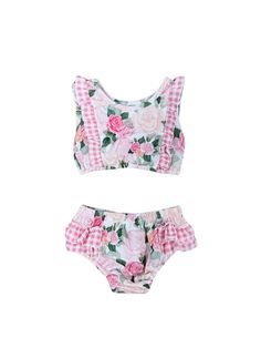 Dive into summer charm with our Country Floral Pink Girls Gingham Plaid Ruffle 2 Piece Swimsuit. Featuring a delightful pink and green floral print and adorned with pink gingham plaid ruffle trim, this swimsuit is a sweet blend of country chic and beach vibes. Perfect for pool parties or sunny days at the beach, it ensures she's stylish and comfortable all season long. And be sure to check out our other must have new arrivals. INCLUDES: 2 Piece Swimsuit FIT: This item is true to size FABRIC & CA Summer Cotton Swimwear With Ruffles, Cotton Gingham Swimwear For Summer, Pink Ruffled Straps Swimwear For Spring, Sleeveless Gingham Swimwear For Spring, Pink Cotton Swimwear For The Pool, Pink Ruffled Swimwear For Summer, Playful Gingham Swimwear For Spring, Gingham Ruffled Swimwear For Vacation, Gingham Ruffled Swimwear For Poolside